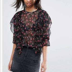 Frilled long sleeve floral blouse